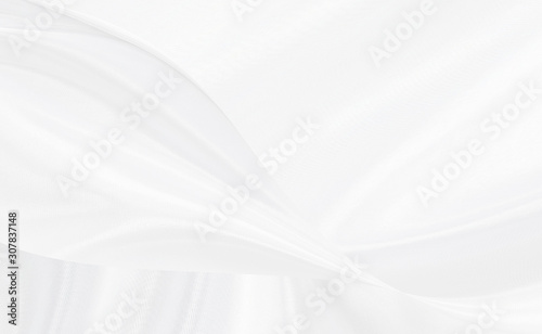 White gray satin texture that is white silver fabric silk background with beautiful soft blur pattern natural.