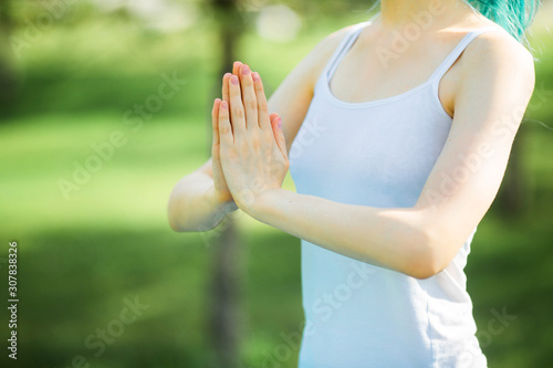 woman hands in summer yoga pose