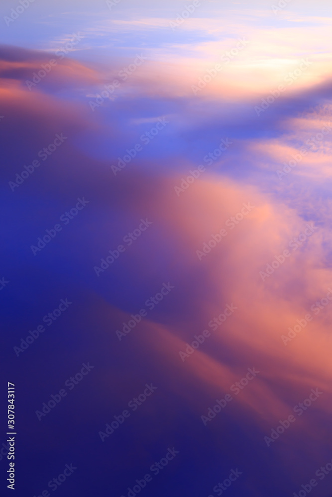 Abstract fantasy softly blue mountain clouds background, Gold fog with sun highlight on blue sky and moving cloud before sunset by airal view