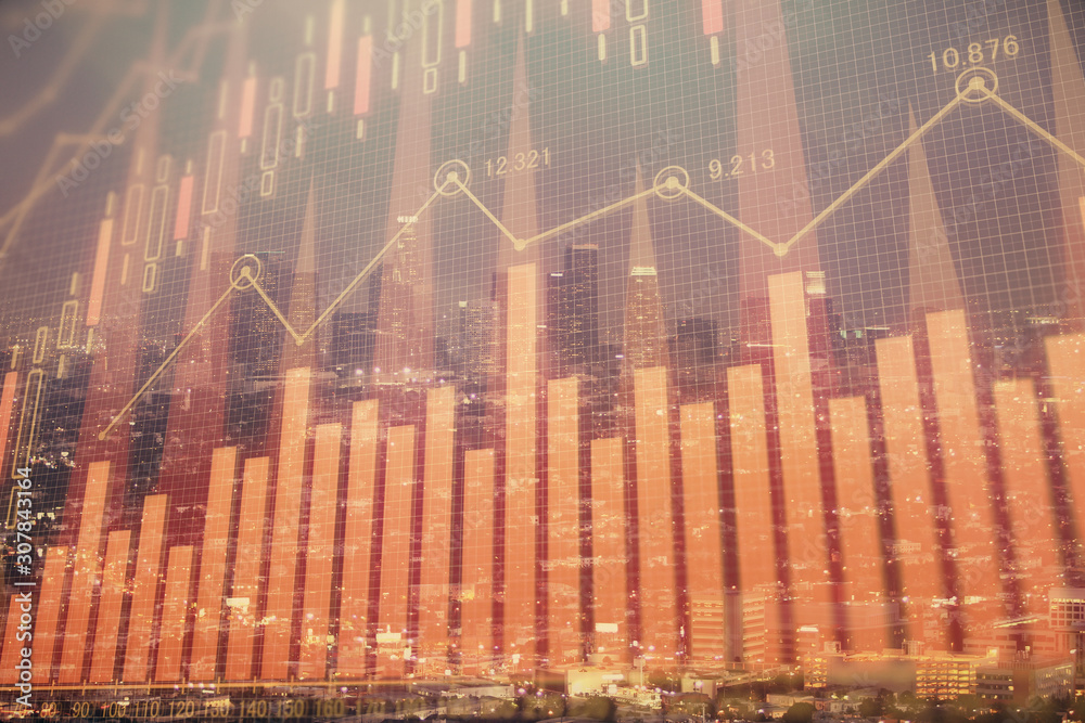 Financial graph on night city scape with tall buildings background double exposure. Analysis concept. Financial graph on night city scape with tall buildings background double exposure. Analysis concept.