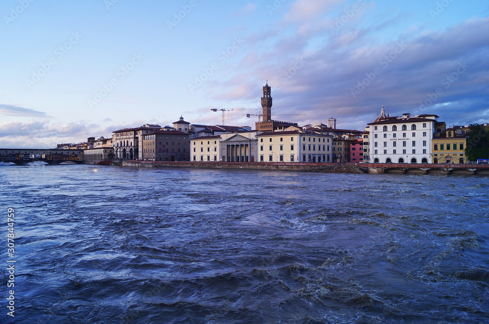 Fototapeta premium The swollen river Arno in Florence, Italy