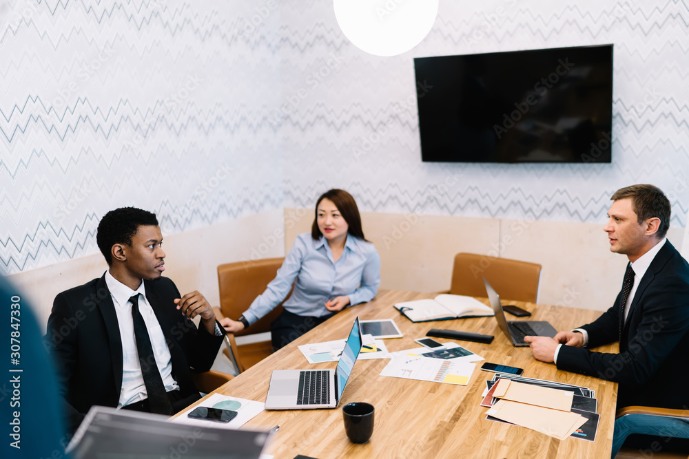 Business people discussing ideas at workplace