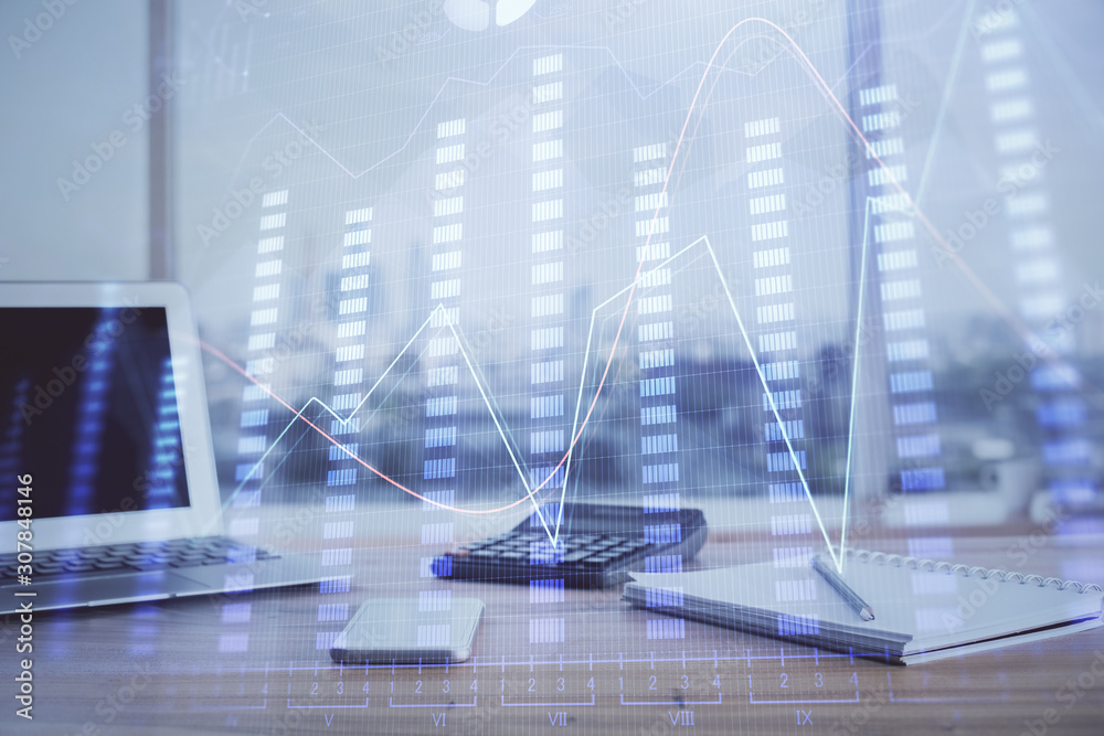 Stock market graph on background with desk and personal computer. Double exposure. Concept of financial analysis. Stock market graph on background with desk and personal computer. Double exposure. Concept of financial analysis.
