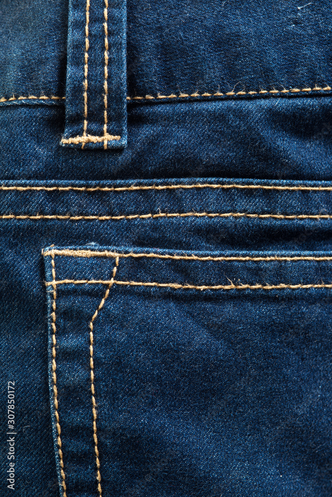 Blue jeans denim fabric texture and background. Blue jeans denim fabric texture and background.