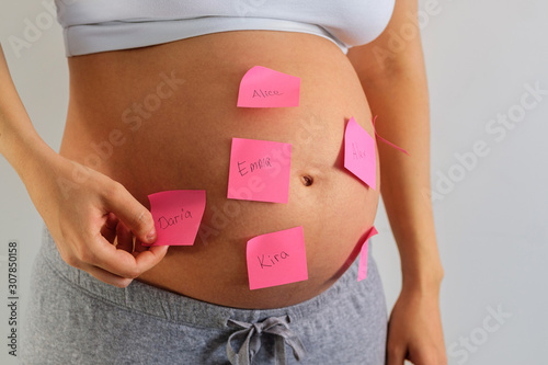 Wallpaper Mural Belly of a pregnant woman with stickers Torontodigital.ca