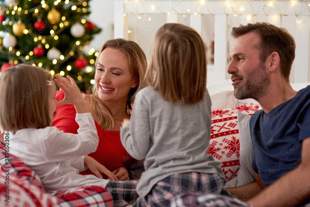 Happy family during the Christmas time Happy family during the Christmas time