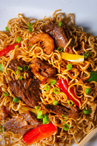 Fried Mie noodles with beef and vegetables.