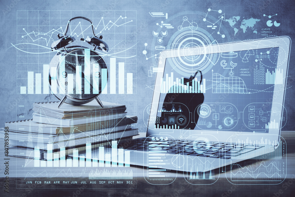 Fototapeta premium Financial graph colorful drawing and table with computer on background. Double exposure. Concept of international markets.