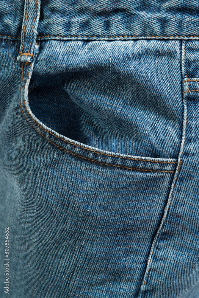 Blue jeans denim fabric texture and background. Blue jeans denim fabric texture and background.