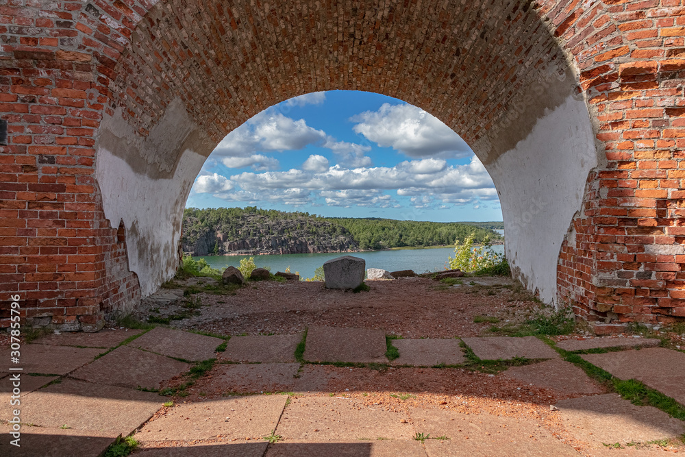 Obraz premium Ancient cast iron cannons, Bomarsund fortress, Sund, Aland Islands, Finland The old ruins of a fortress &nbsp; Red brick