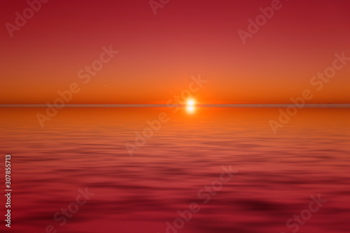 Fototapeta Naklejka Na Ścianę i Meble -  Seascape with a beautiful sunset over the water.