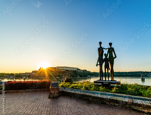 Fotografie Novi Sad, Serbia June 02, 2019: Monument to the victims of fascism in Novi Sad, Serbia, Petrovaradin fortress and Danube's shore