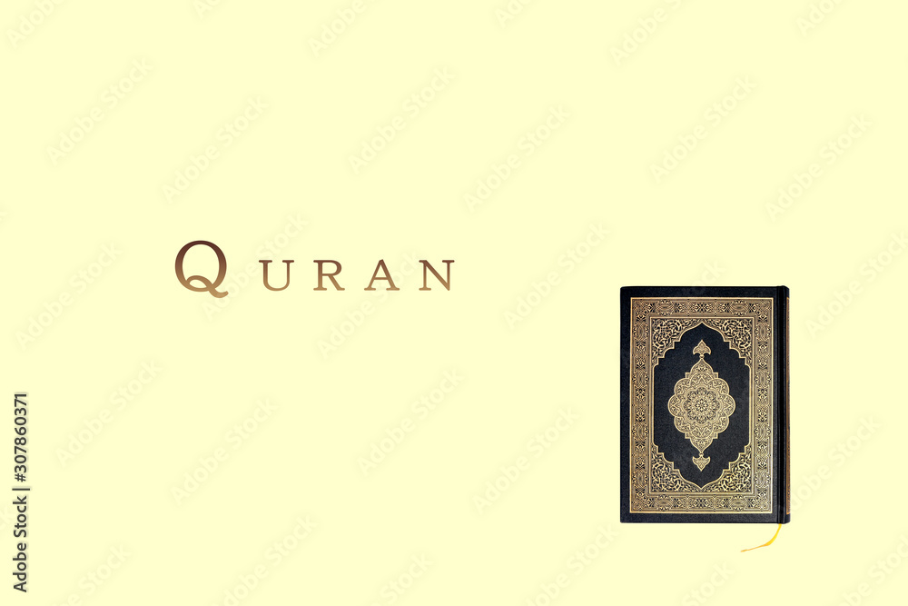 Quran book isolated on white background - copy space for text Holly Qur'an or Koran, is the central religious text of Islam, which Muslims believe to be a revelation from God. classical Arabic liter Quran book isolated on white background - copy space for text Holly Qur'an or Koran, is the central religious text of Islam, which Muslims believe to be a revelation from God. classical Arabic liter