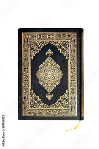 Quran book isolated on white background - close up Holly Qur'an or Koran, is the central religious text of Islam, which Muslims believe to be a revelation from God. classical Arabic liter