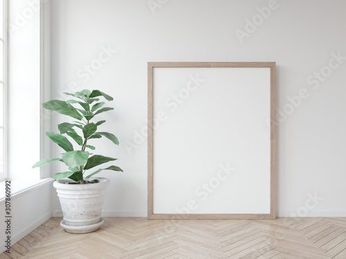 Fototapeta Naklejka Na Ścianę i Meble -  Mock up poster with vertical wooden frame standing on wooden floor with green plant in white pot. Scandinavian frame mockup. 3D illustrations