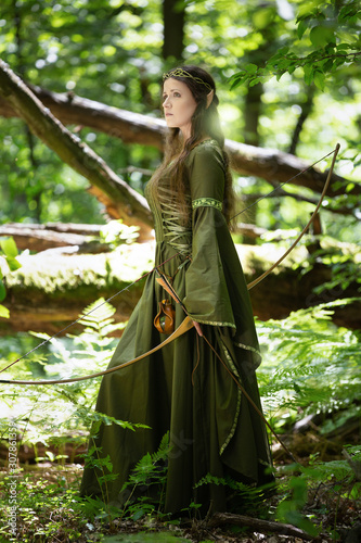 Dekoracja na wymiar  elf-woman-in-a-green-dress-in-the-forest