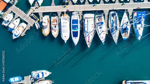 Top view of luxury yachts in the harbor, aerial shoot with drone