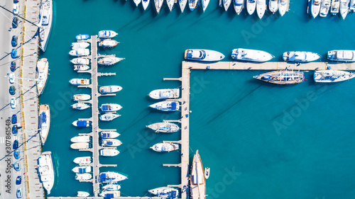 Top view of luxury yachts in the harbor, aerial shoot with drone