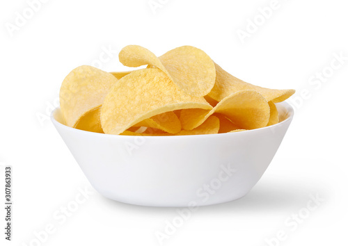 Bowl of potato chips isolated on white.