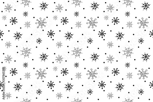 Seamless image pattern with black and white snowflakes and black dots on white background. Doodle hand drawn style. Christmas winter mood. Stock illustration for web, print and textile 