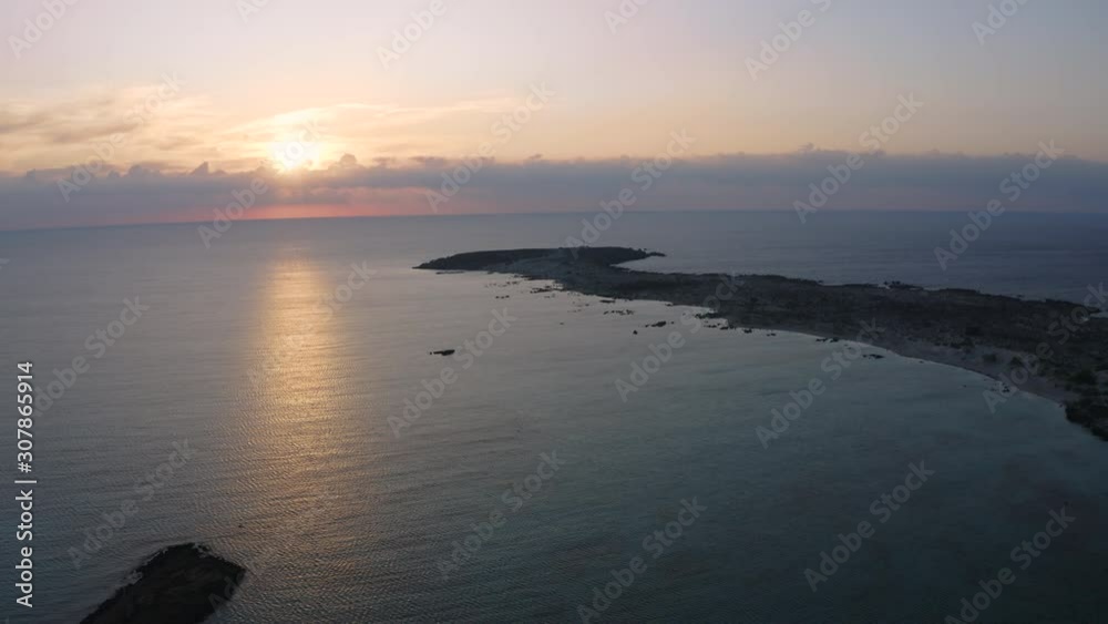 Flyover Ocean at Sunset. Beautiful Aerial Relax Landscape. Flying from above island Flyover Ocean at Sunset. Beautiful Aerial Relax Landscape. Flying from above island