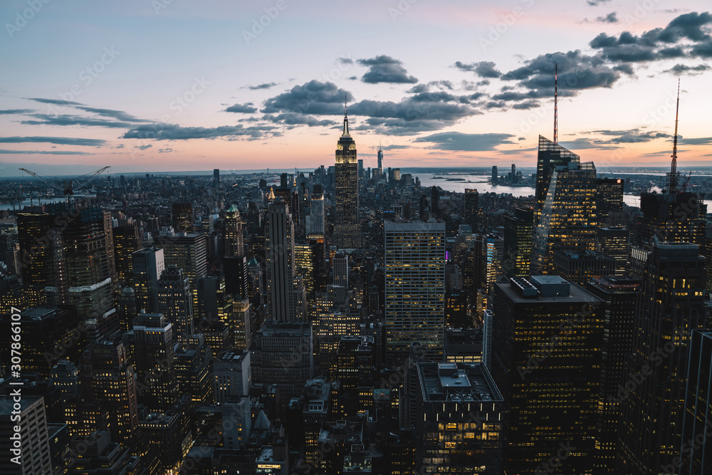 Fototapeta premium Manhattan on background of evening sky