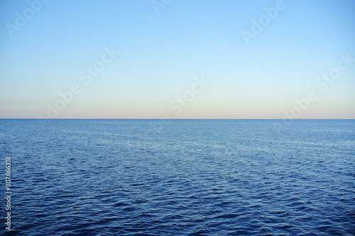 simple seascape at sunset without unnecessary details and a smooth horizon line
