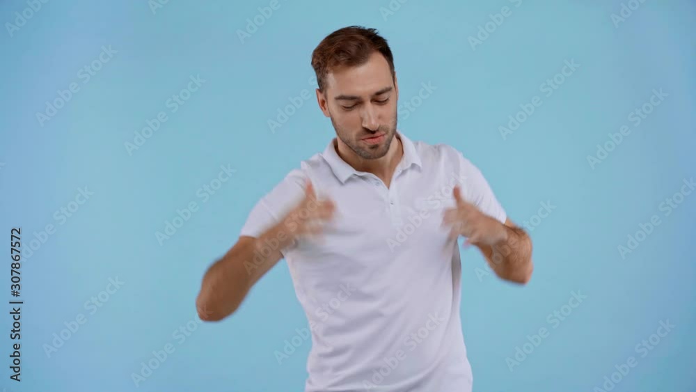 smiling man dancing isolated on blue smiling man dancing isolated on blue