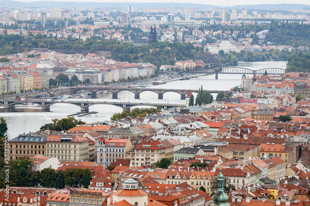View of Prague's Red Roofed Buildings and Bridges over Vltava River