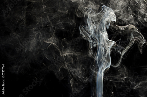 movement  white smoke on a black background © Анастасия Жукова