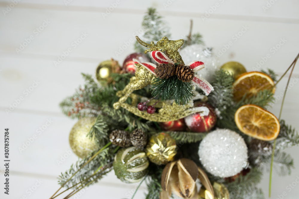New year christmas decoration with spices, cinnamon, mandarin, eve on white wooden background New year christmas decoration with spices, cinnamon, mandarin, eve on white wooden background