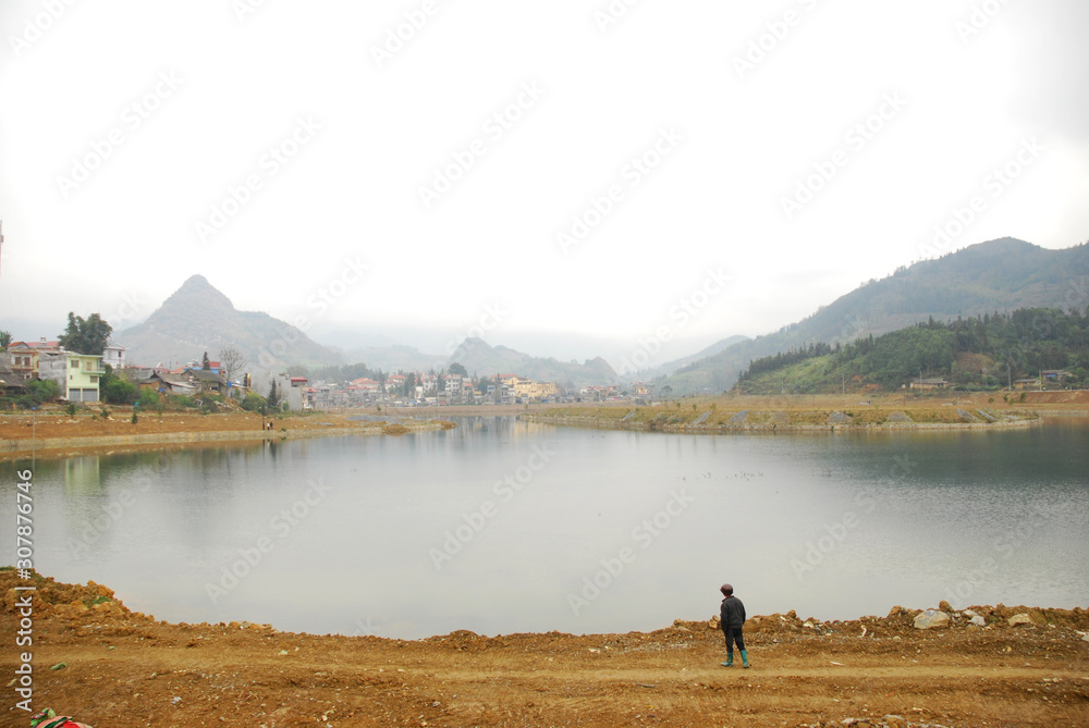 Beautiful lakeside at Sapa, Vietnam. Lao Chai Village is one of the most imposing landmarks of Sapa which is home to the Black H'mong. Beautiful lakeside at Sapa, Vietnam. Lao Chai Village is one of the most imposing landmarks of Sapa which is home to the Black H'mong.