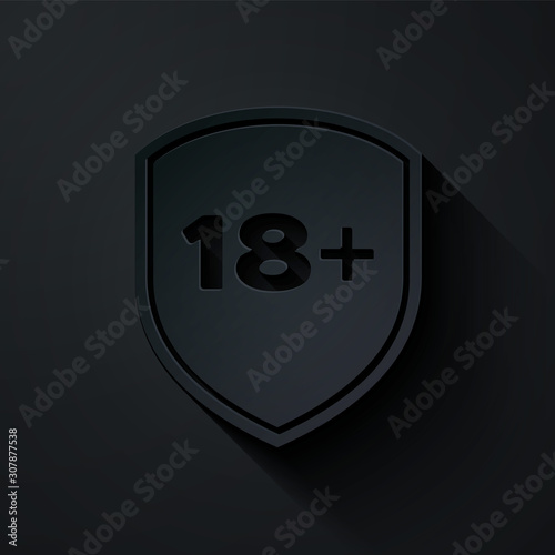 Paper cut Shield with inscription 18 plus icon isolated on black background. Adults content only. Protection, safety, security, protect concept. Paper art style. Vector Illustration