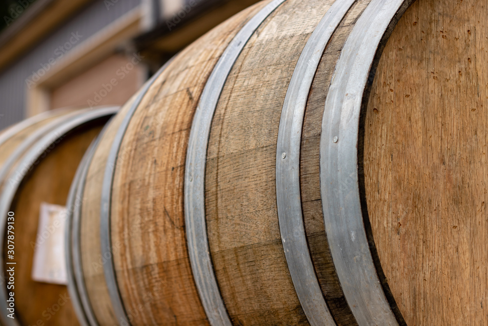 Kegs recently filled with wine ready to be transported into wine cellar to begin aging process in a mountain vineyard in Virginia Kegs recently filled with wine ready to be transported into wine cellar to begin aging process in a mountain vineyard in Virginia