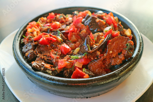 Fototapeta Naklejka Na Ścianę i Meble -  Plate of Georgian Eggplant Stew, a Tasty Vegetarian Dish Called Ajapsandali 