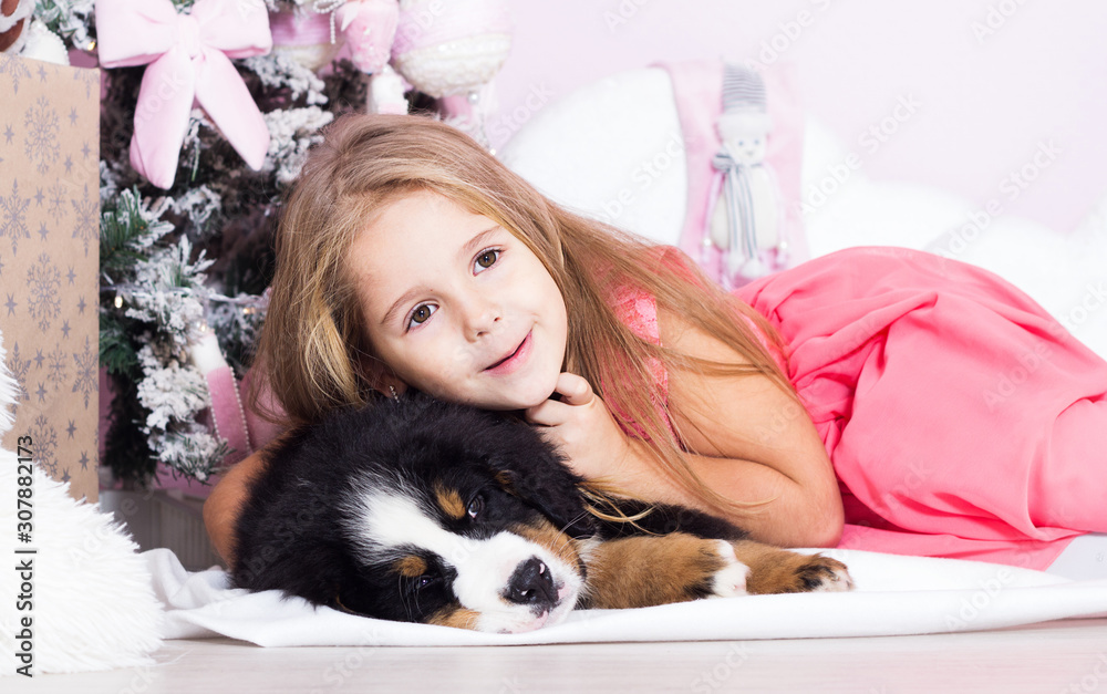 little girl and puppy new year