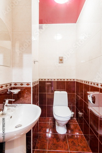 Russia  Omsk- August 02  2019  interior room apartment. standard repair decoration in hostel. bathroom  sink  decoration elements  toilet