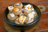 Soko Ketze or Georgian Stuffed Mushrooms with Sulguni Cheese Baked in a Ketsi Clay Dish
