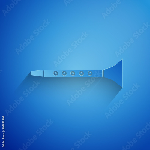 Paper cut Clarinet icon isolated on blue background. Musical instrument. Paper art style. Vector Illustration