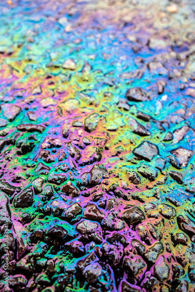 Fototapeta premium Petrol Oil Pollution Rainbow Gasoline Leak on Pavement