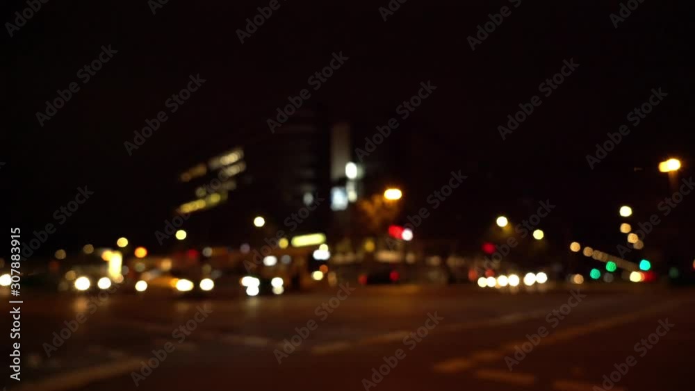 Defocused view of busy intersection in Berlin with street car Defocused view of busy intersection in Berlin with street car