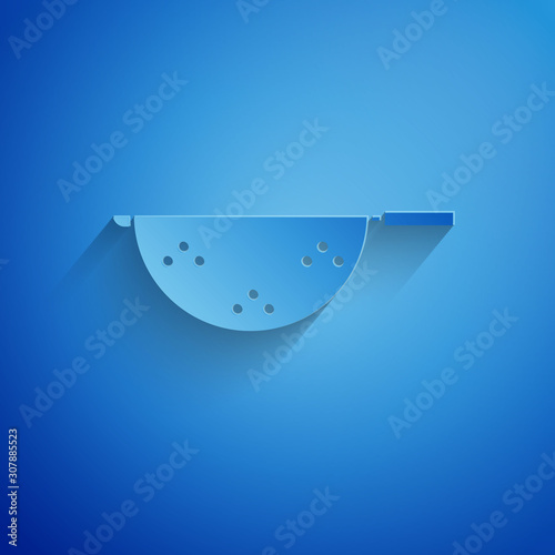 Paper cut Kitchen colander icon isolated on blue background. Cooking utensil. Cutlery sign. Paper art style. Vector Illustration