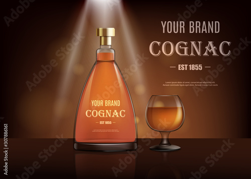 Realistic cognac bottle and glass on spotlight