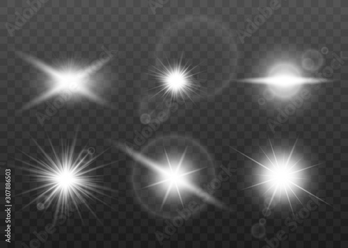 Realistic white sun beam lens flare effect set isolated on dark background