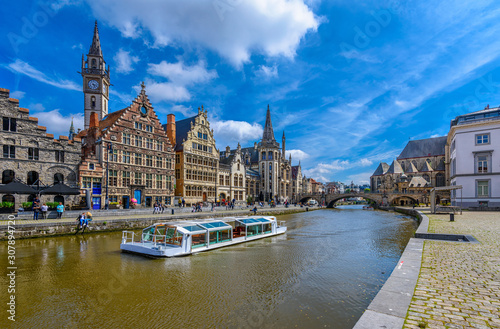 View of Graslei  Korenlei quays and Leie river in the historic city center in Ghent  Gent   Belgium. Architecture and landmark of Ghent. Sunset cityscape of Ghent.