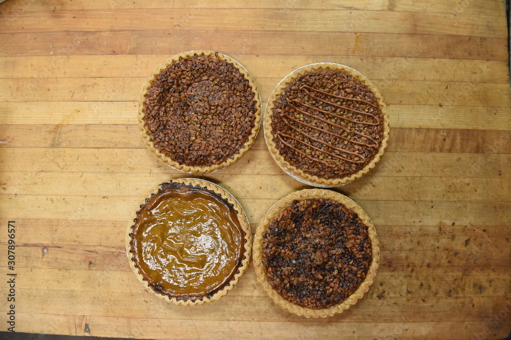Assorted holiday pies: pumpkin, pecan, caramel drizzle Assorted holiday pies: pumpkin, pecan, caramel drizzle