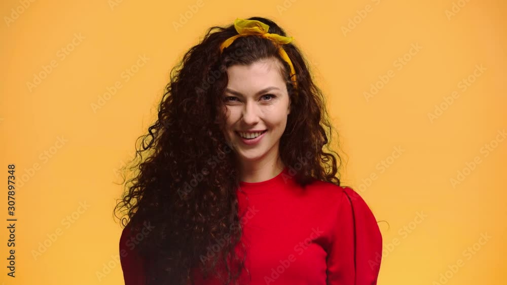 happy girl showing thumb up isolated on orange happy girl showing thumb up isolated on orange