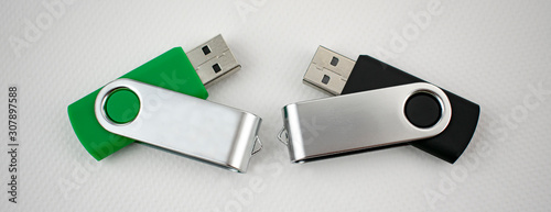 USB devices for data storage made of metal and plastic elements, open, on white background photo