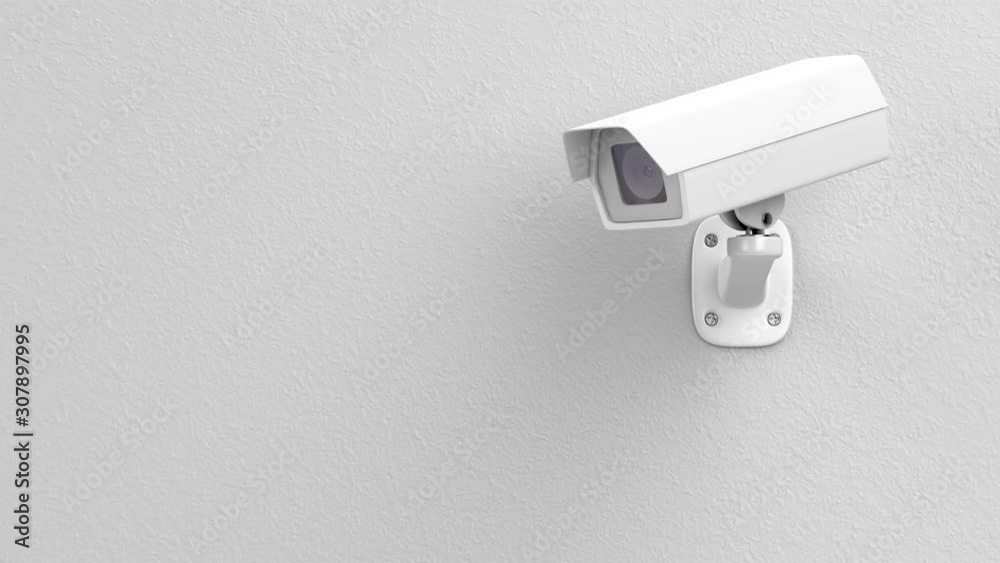 Surveillance camera on the wall Surveillance camera on the wall