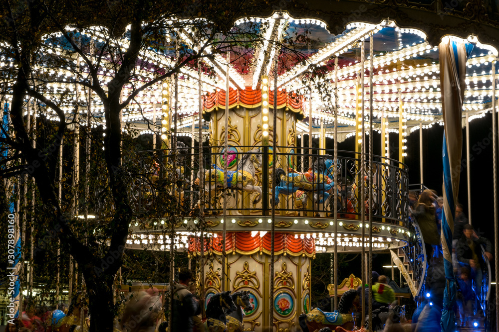 Carousel lighted on the night of the city